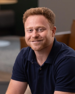 smiling person in professional attire